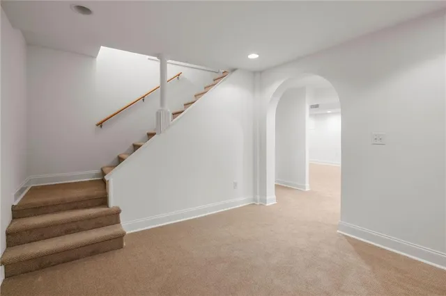 a backyard of a house with yard barbeque oven and outdoor seating