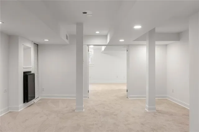 a view of a patio with chairs and tables