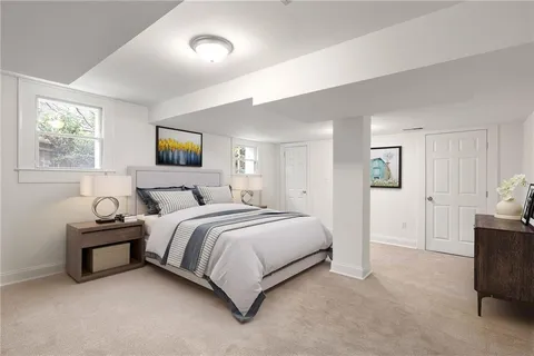 a view of a house with backyard sitting area and garden