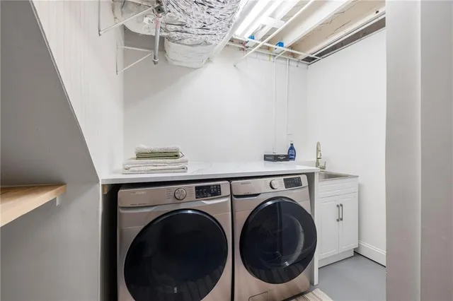 a view of a backyard with furniture and a fire pit