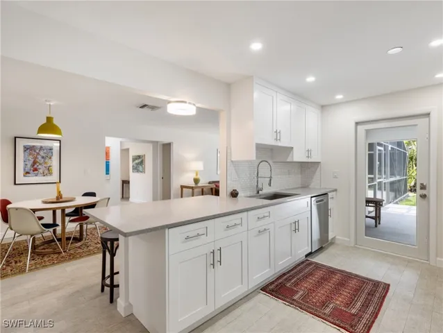 a dining room with furniture and a table