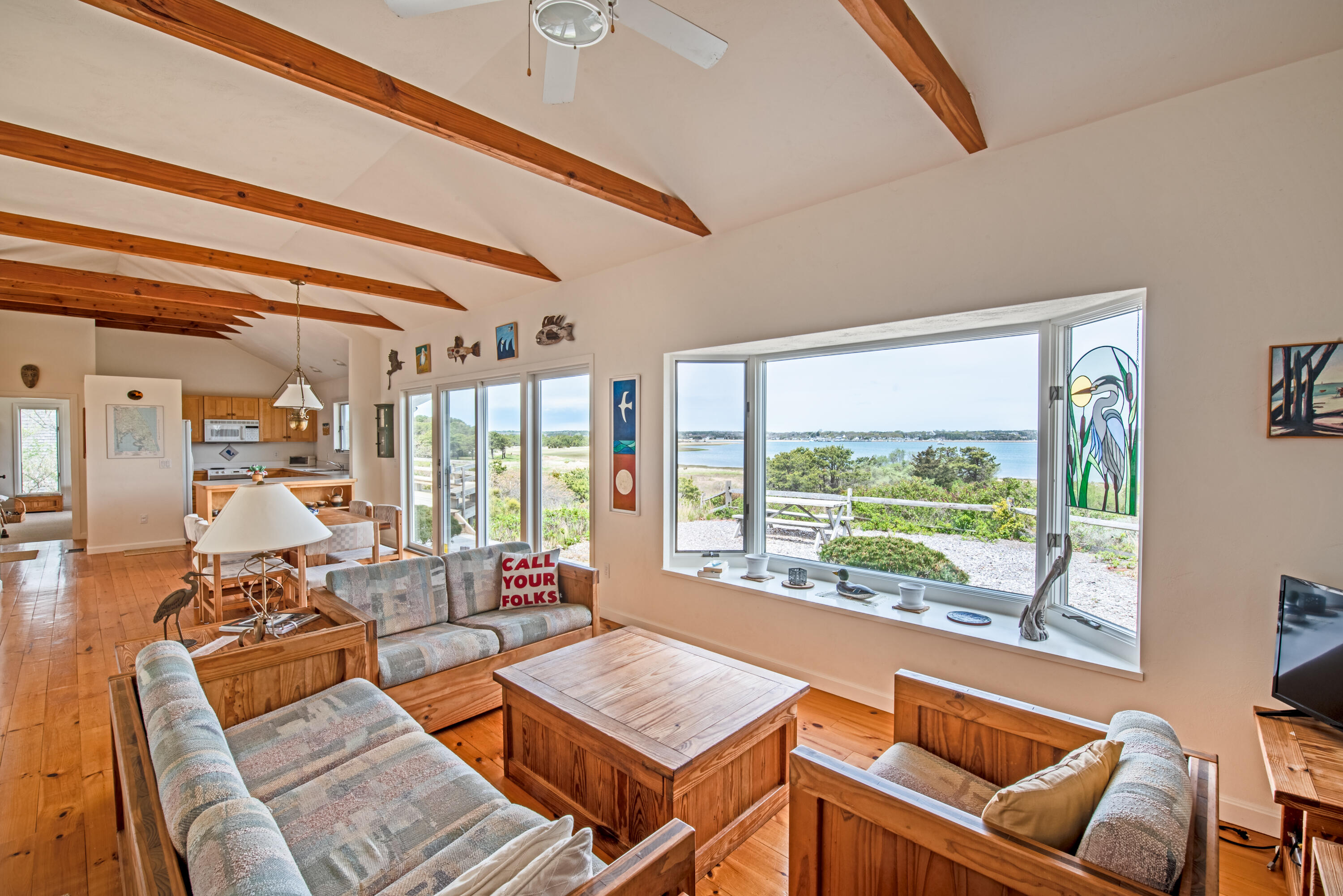 40 Ione Road Wellfleet, MA 02667 - Photo 16 of 30 a living room with furniture and a large window