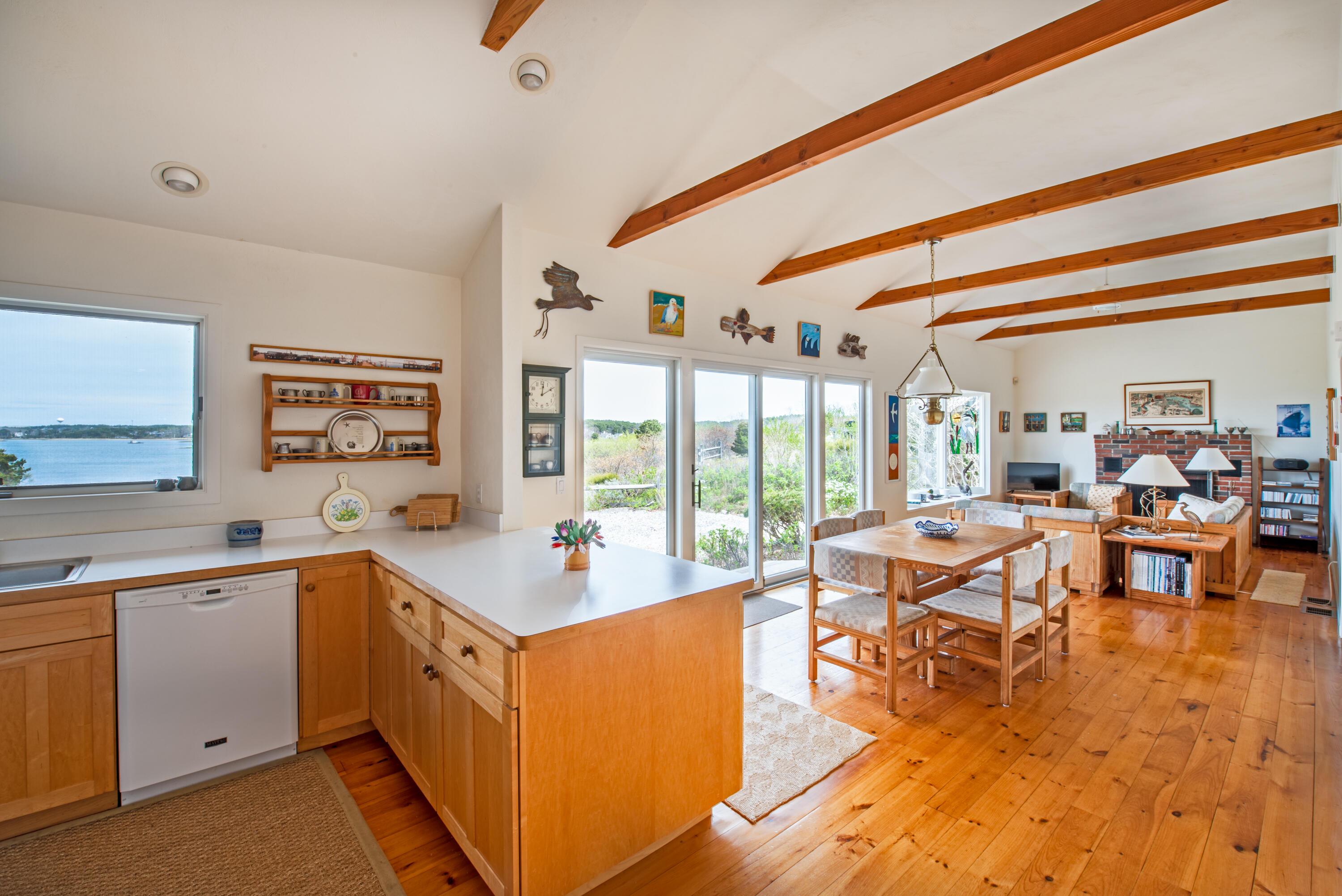 40 Ione Road Wellfleet, MA 02667 - Photo 20 of 30 a very nice looking living room with wooden floor and furniture