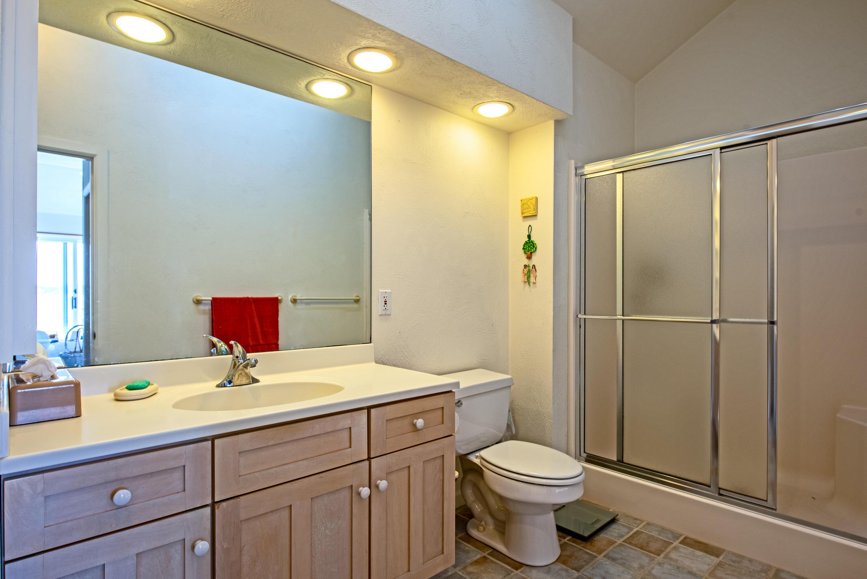 40 Ione Road Wellfleet, MA 02667 - Photo 24 of 30 a bathroom with a sink toilet and shower