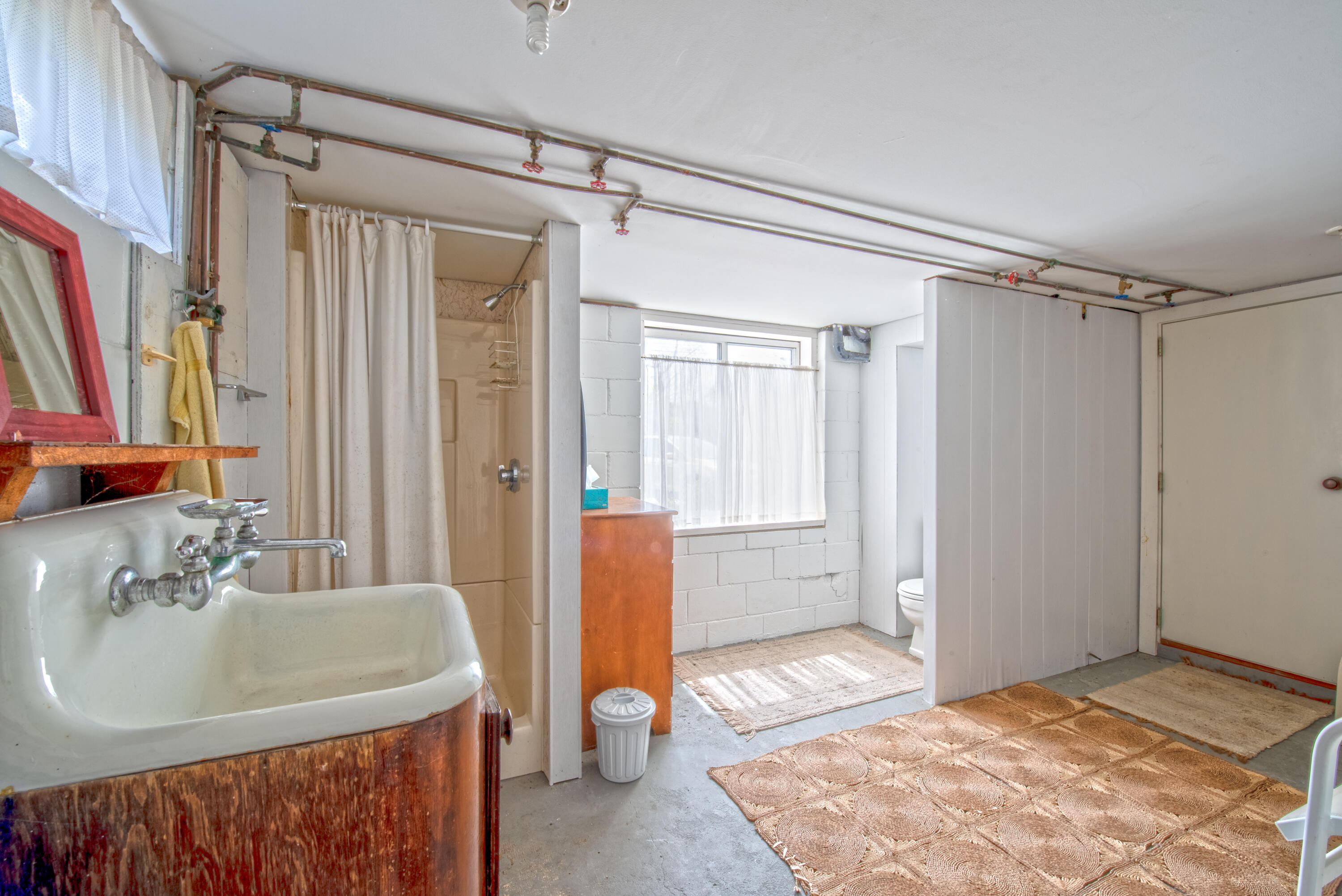 40 Ione Road Wellfleet, MA 02667 - Photo 29 of 30 a bathroom with a sink toilet and shower