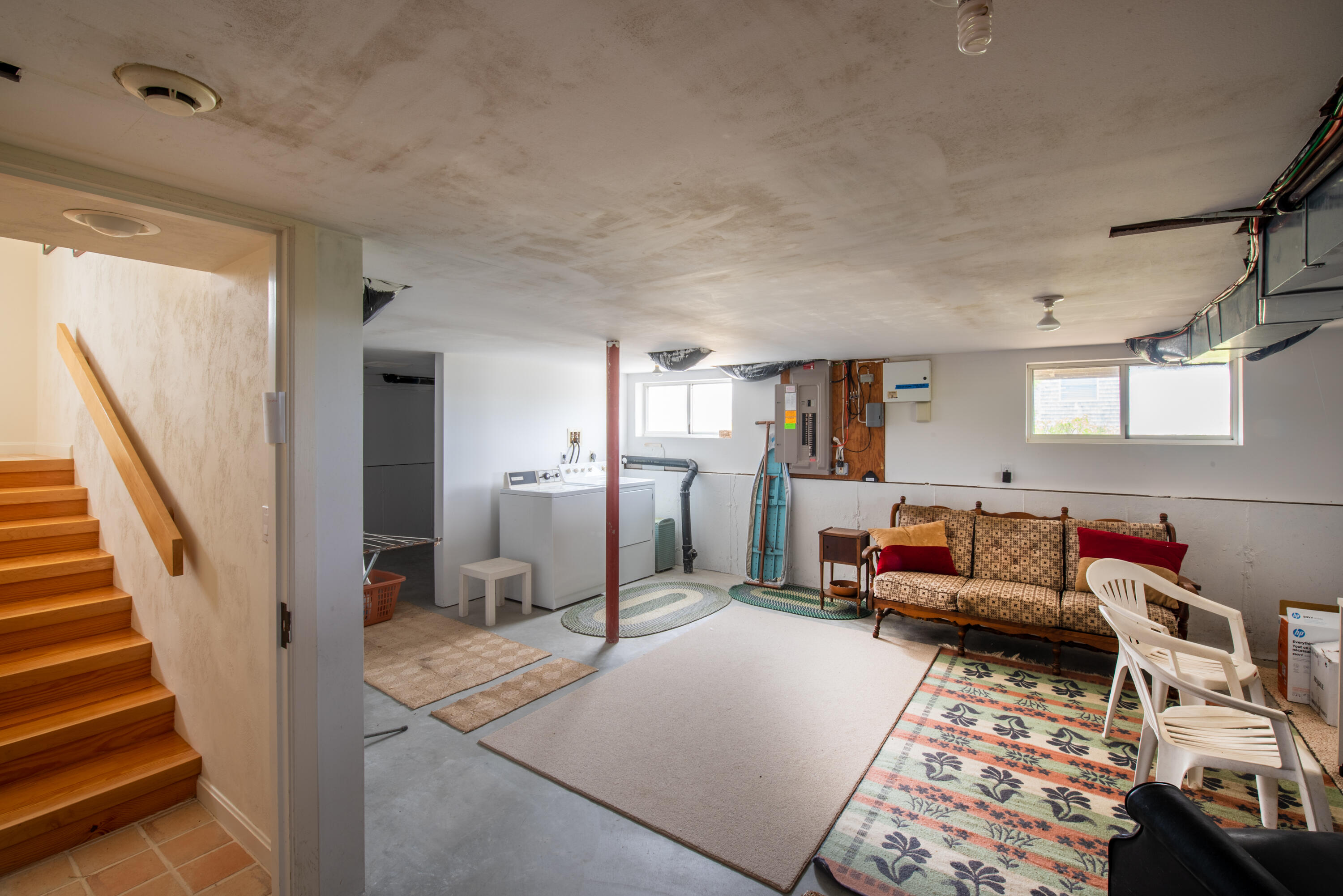 40 Ione Road Wellfleet, MA 02667 - Photo 30 of 30 a living room with furniture and a flat screen tv