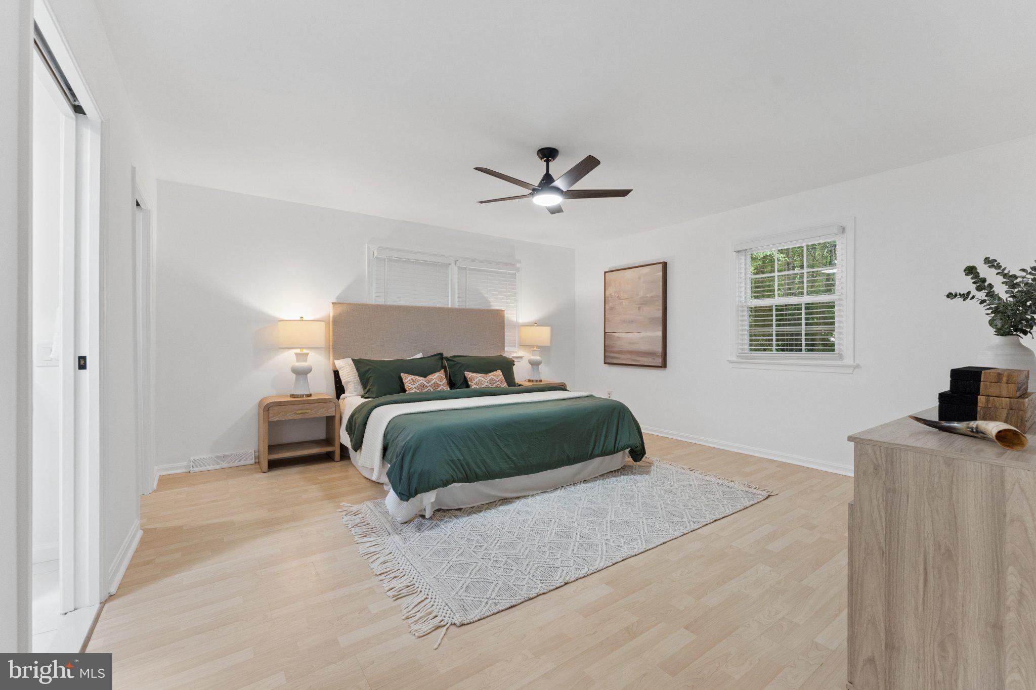3219 Fox Mill Road Oakton, VA 22124 - Photo 28 of 87 Serene bedroom with modern elegance.