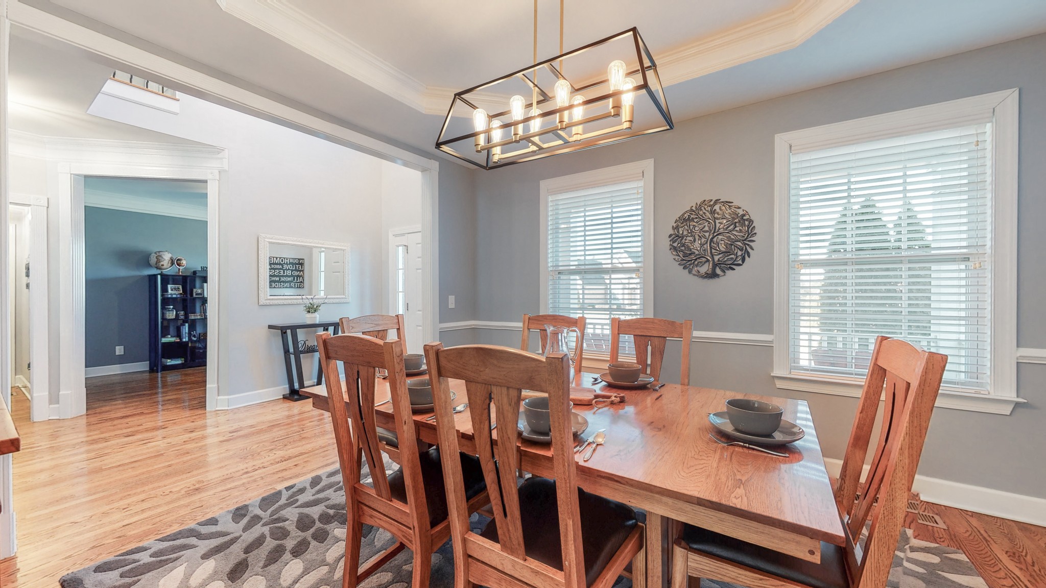 6137 Stags Leap Way Franklin, TN 37064 - Photo 11 of 24 a view of a dining room with furniture window and wooden floor