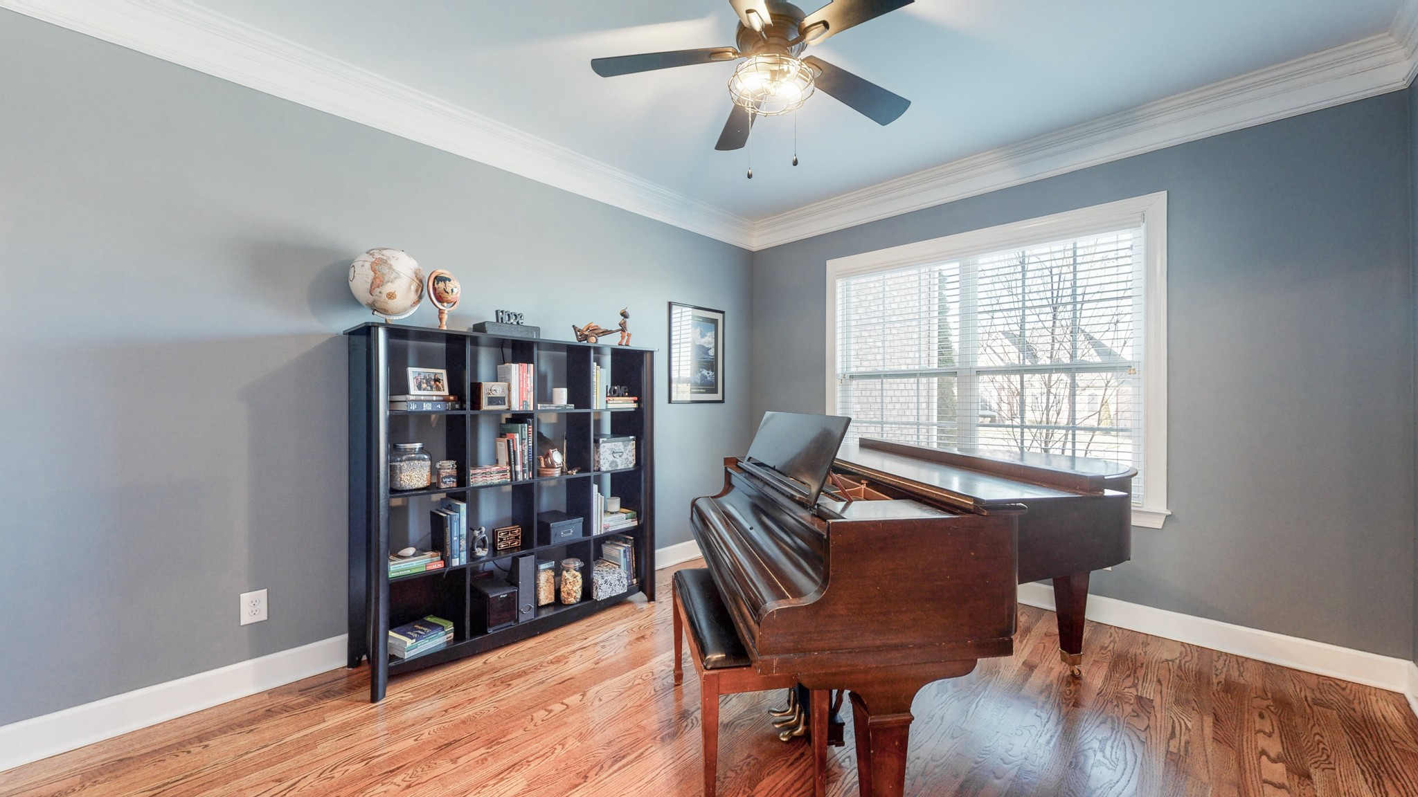 6137 Stags Leap Way Franklin, TN 37064 - Photo 12 of 24 a view of a dining room with furniture and wooden floor