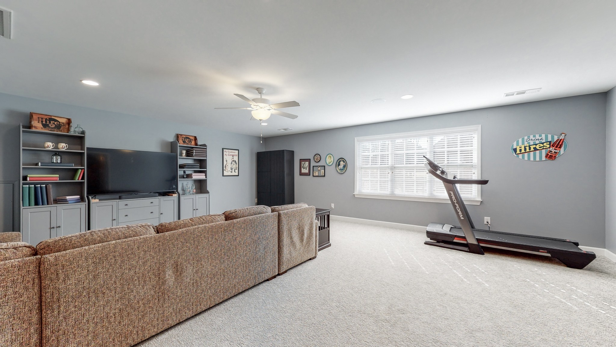 6137 Stags Leap Way Franklin, TN 37064 - Photo 18 of 24 a living room with furniture and a flat screen tv