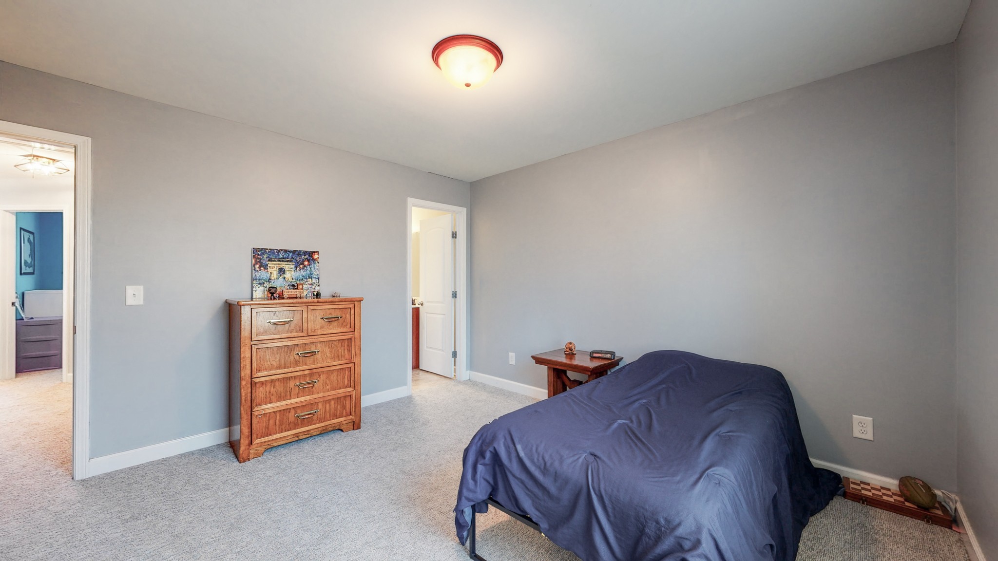 6137 Stags Leap Way Franklin, TN 37064 - Photo 22 of 24 a bed room with a bed and a chair