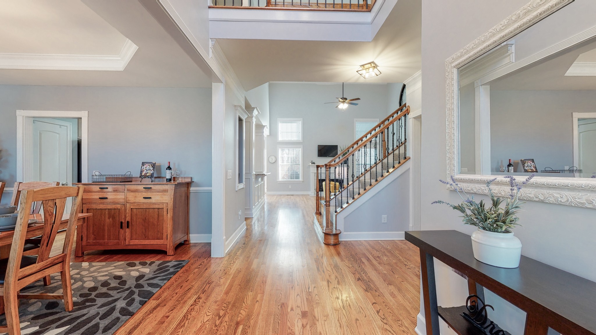 6137 Stags Leap Way Franklin, TN 37064 - Photo 5 of 24 a room with furniture and wooden floor