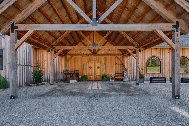 a view of a room with wooden walls