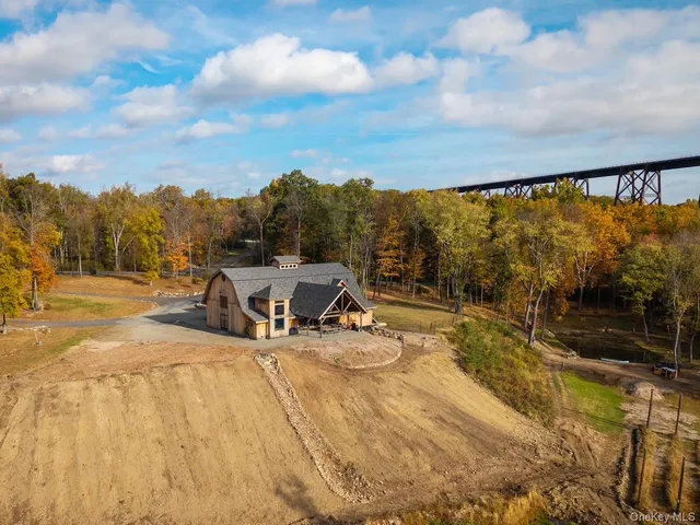 a view of a swimming pool with a lounge chair