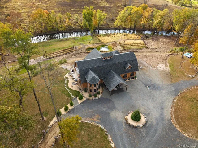 a view of a swimming pool with an ocean view