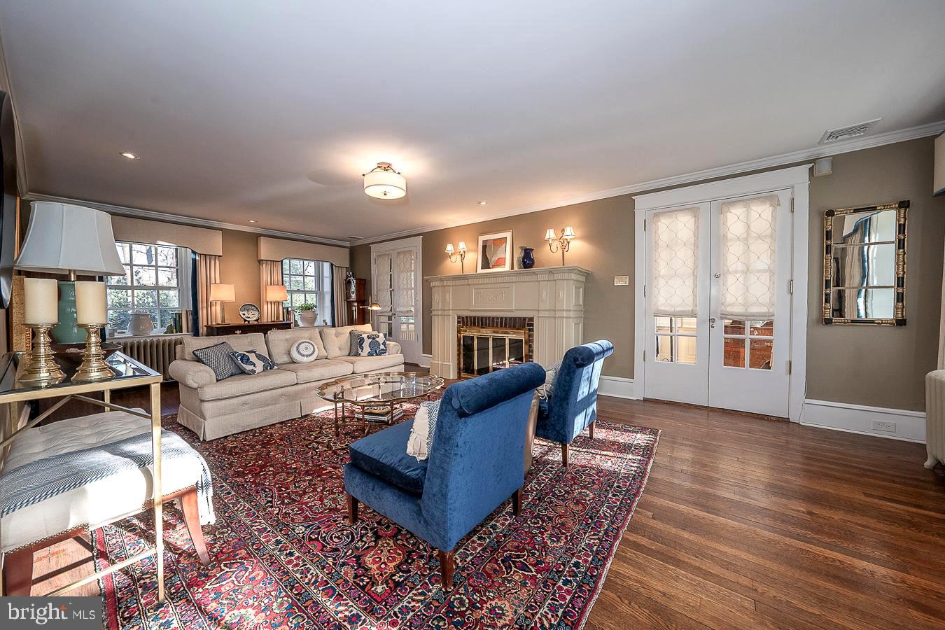 1002 Twyckenham Road Media, PA 19063 - Photo 6 of 45 Gracious Living Room with French doors to Sun Room