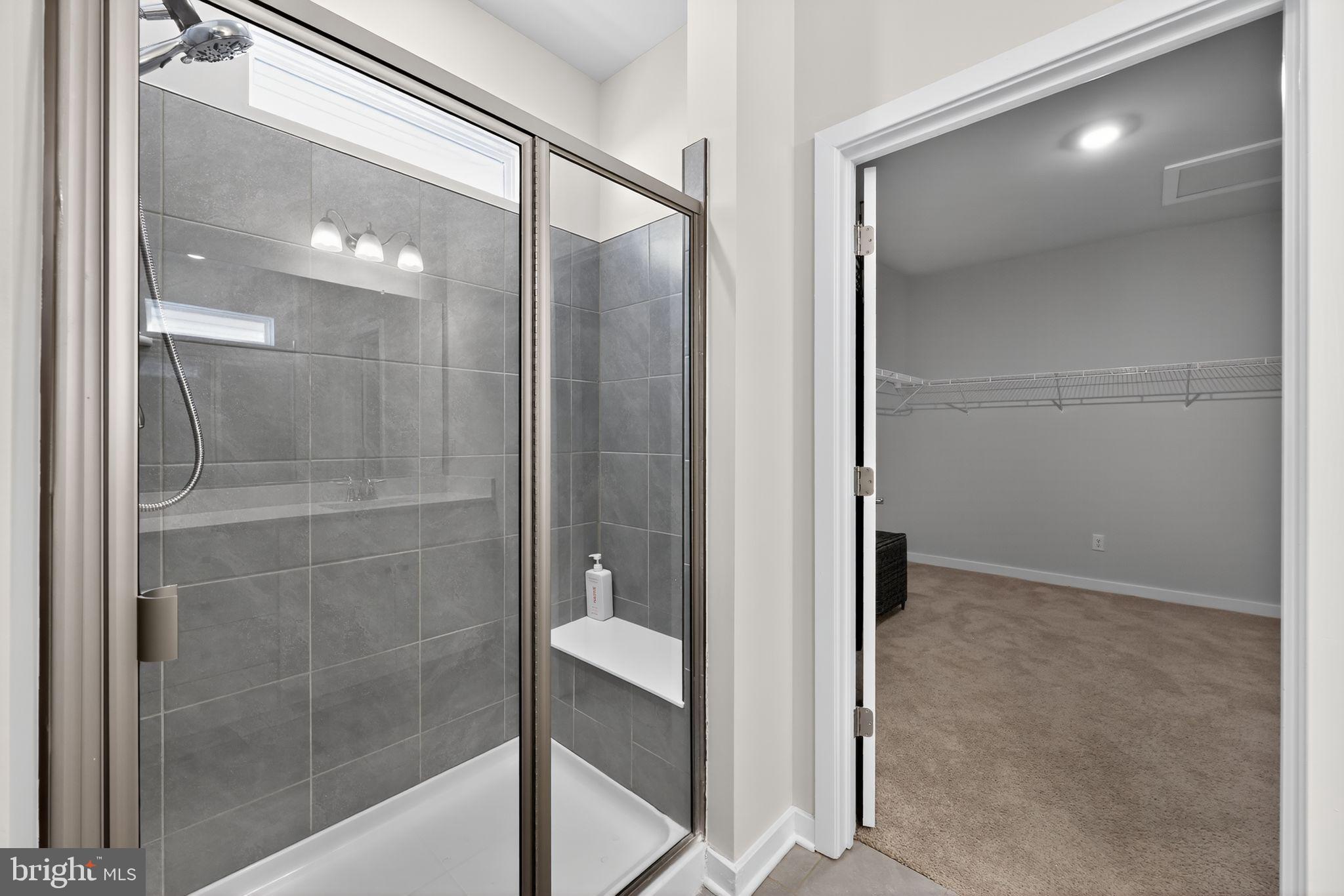 103 Congressional Court Moorestown, NJ 08057 - Photo 20 of 31 a bathroom with a glass shower door