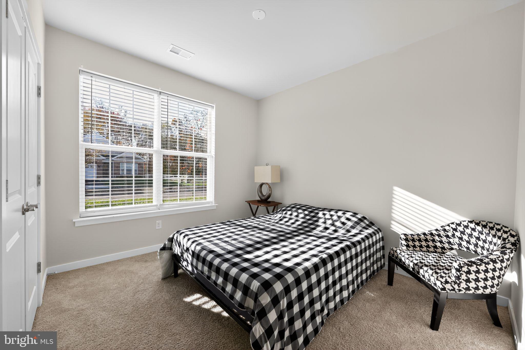 103 Congressional Court Moorestown, NJ 08057 - Photo 22 of 31 a bedroom with a bed and window