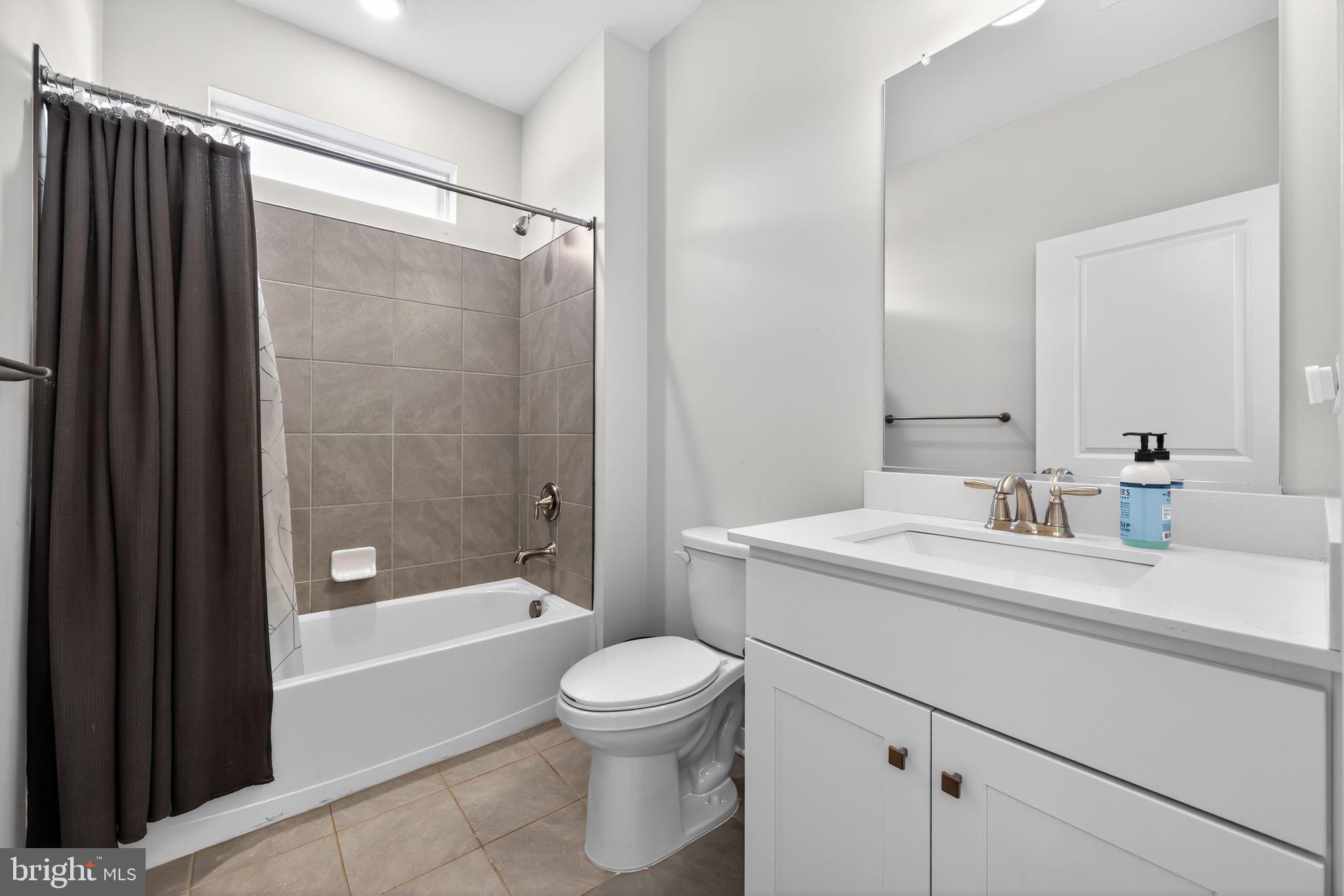 103 Congressional Court Moorestown, NJ 08057 - Photo 23 of 31 a bathroom with a sink a toilet and shower