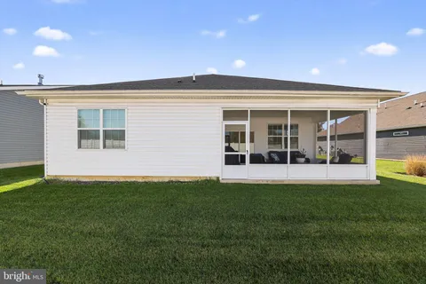 a view of an house with backyard porch and entertaining space