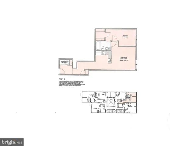 a vase of flowers sitting on a floor