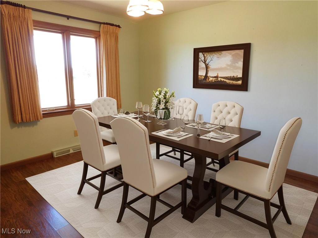 2983 Brown Road Ashtabula, OH 44004 - Photo 12 of 30 Dining area with wood finished floors and baseboards
*AI enhanced