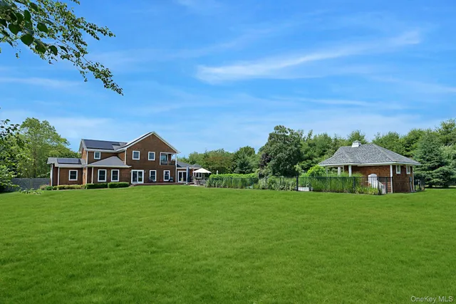 a view of a house with a big yard