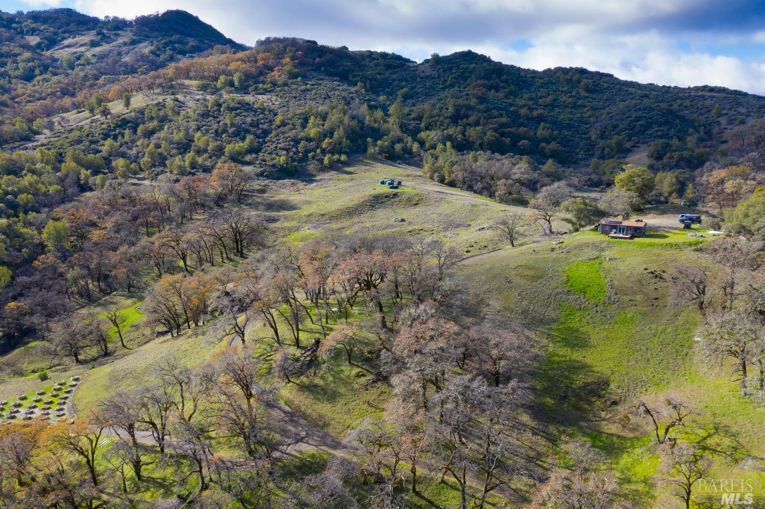 a view of mountains and valleys