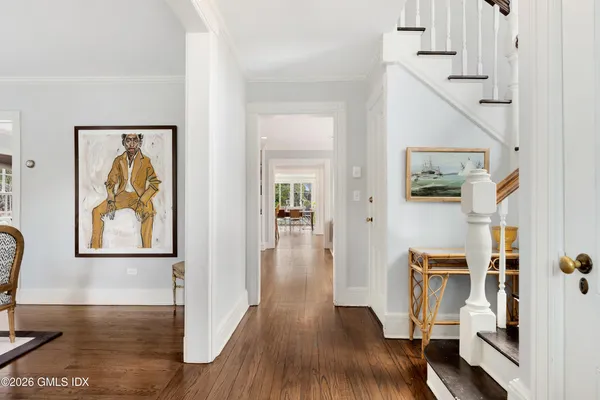 a bathroom with a granite countertop sink a shower and a bathtub