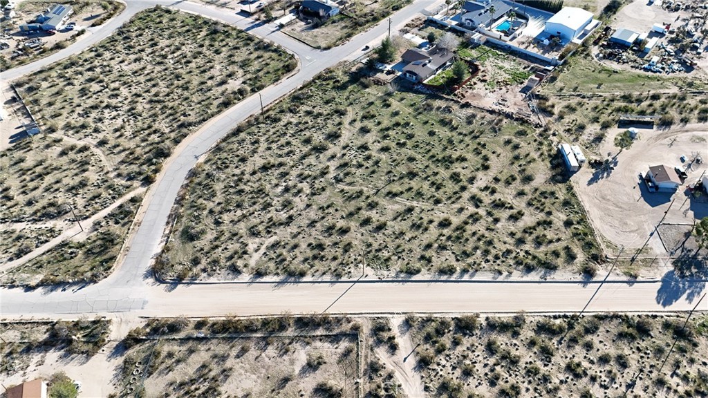 718 Clark Road Lucerne Valley, CA 92356 - Photo 5 of 10 Red boundary lines on pictures are an estimate and for marketing purposes only. Buyer to verify all aspects of this property including, but not limited to location, utilities, assessments, boundaries, usage, access, and zoning to satisfy themselves.