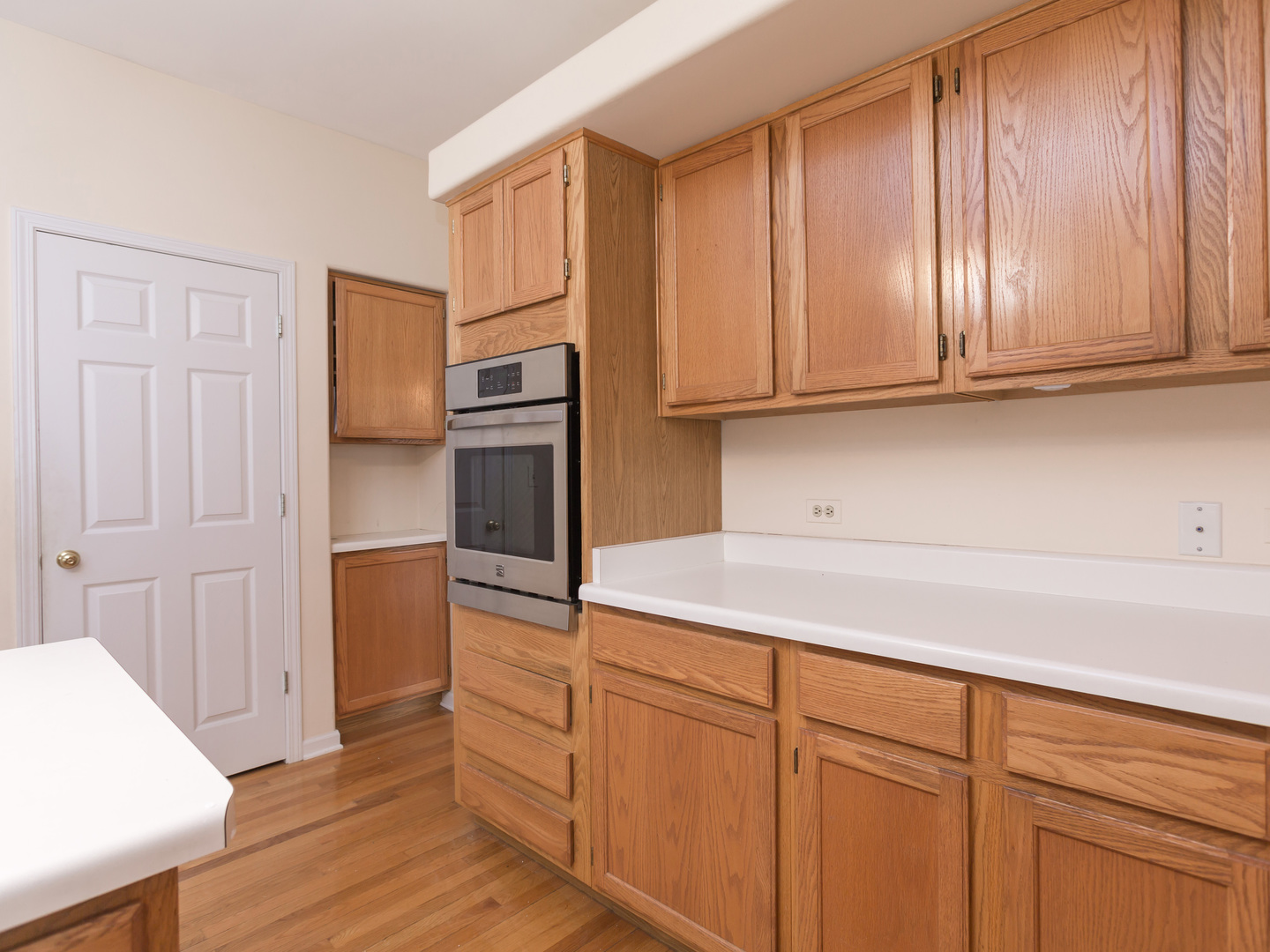 1415 Stonegate Road Algonquin, IL 60102 - Photo 11 of 49 a kitchen with stainless steel appliances granite countertop a refrigerator and cabinets