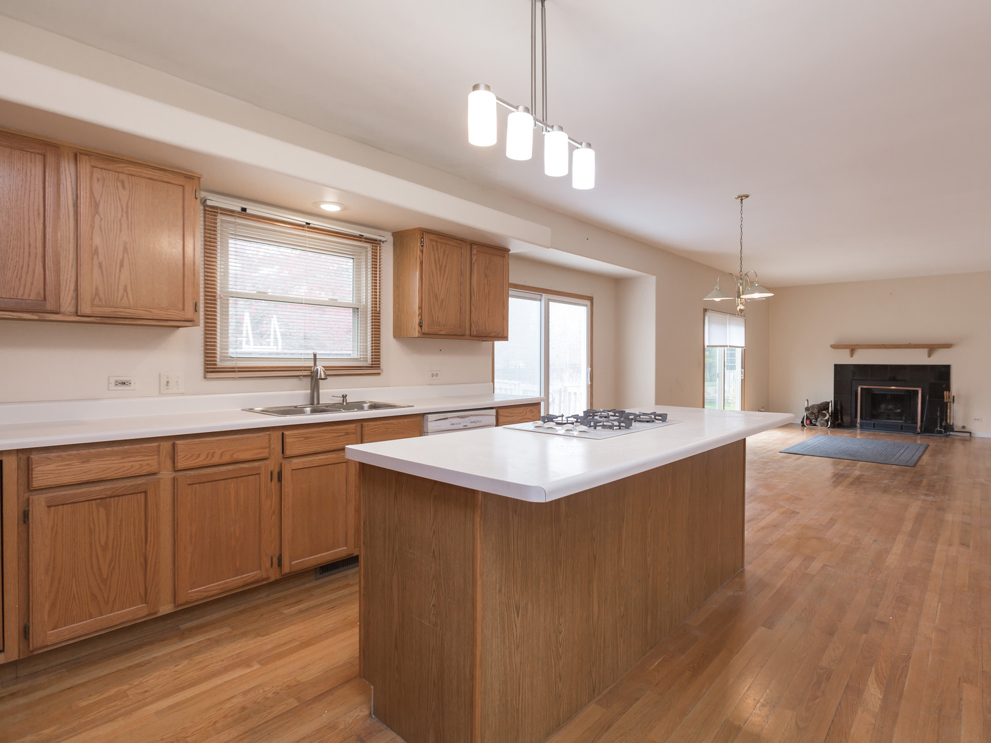 1415 Stonegate Road Algonquin, IL 60102 - Photo 14 of 49 a kitchen with sink stove and cabinets