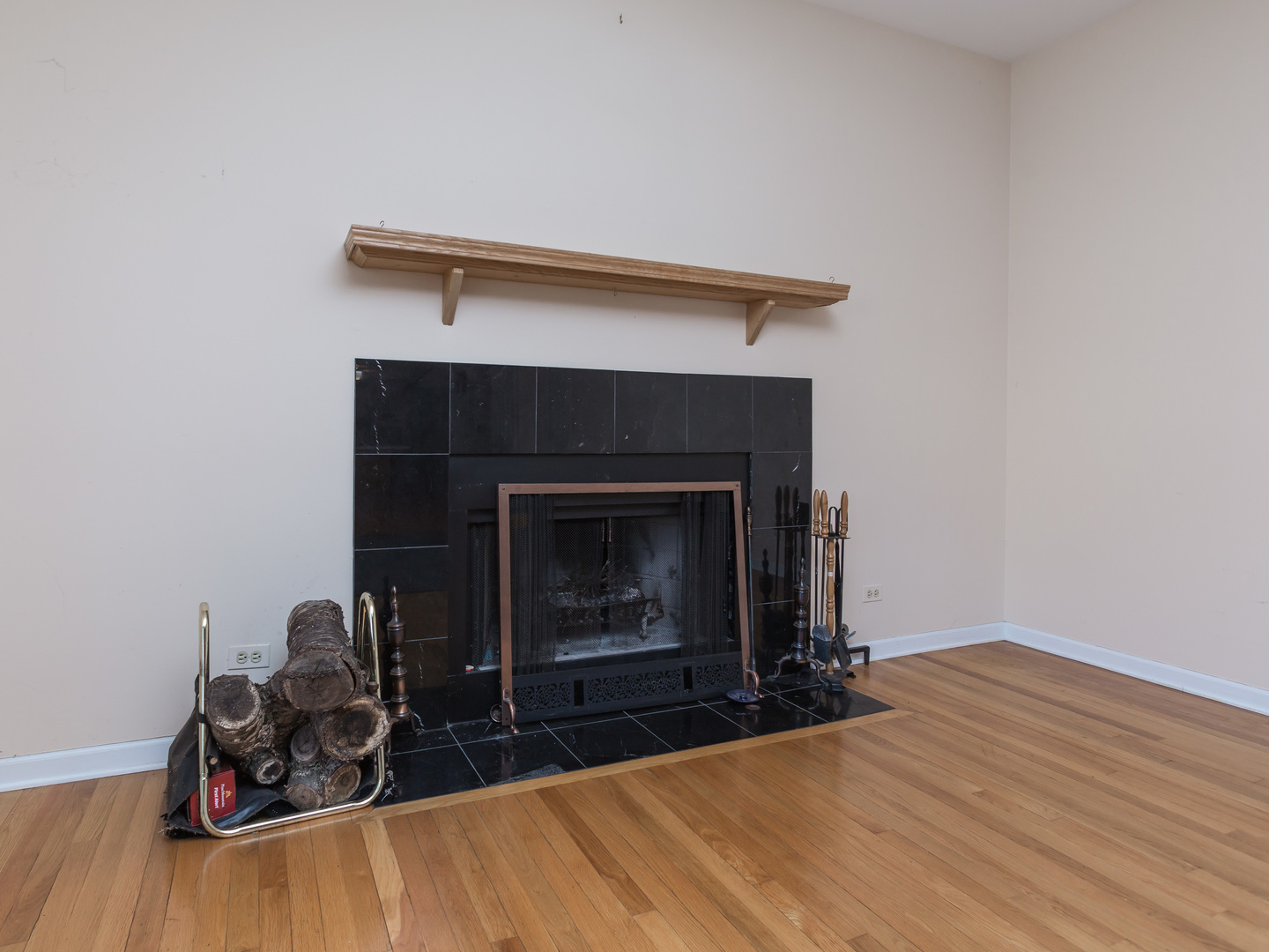 1415 Stonegate Road Algonquin, IL 60102 - Photo 16 of 49 a room with furniture and a fireplace