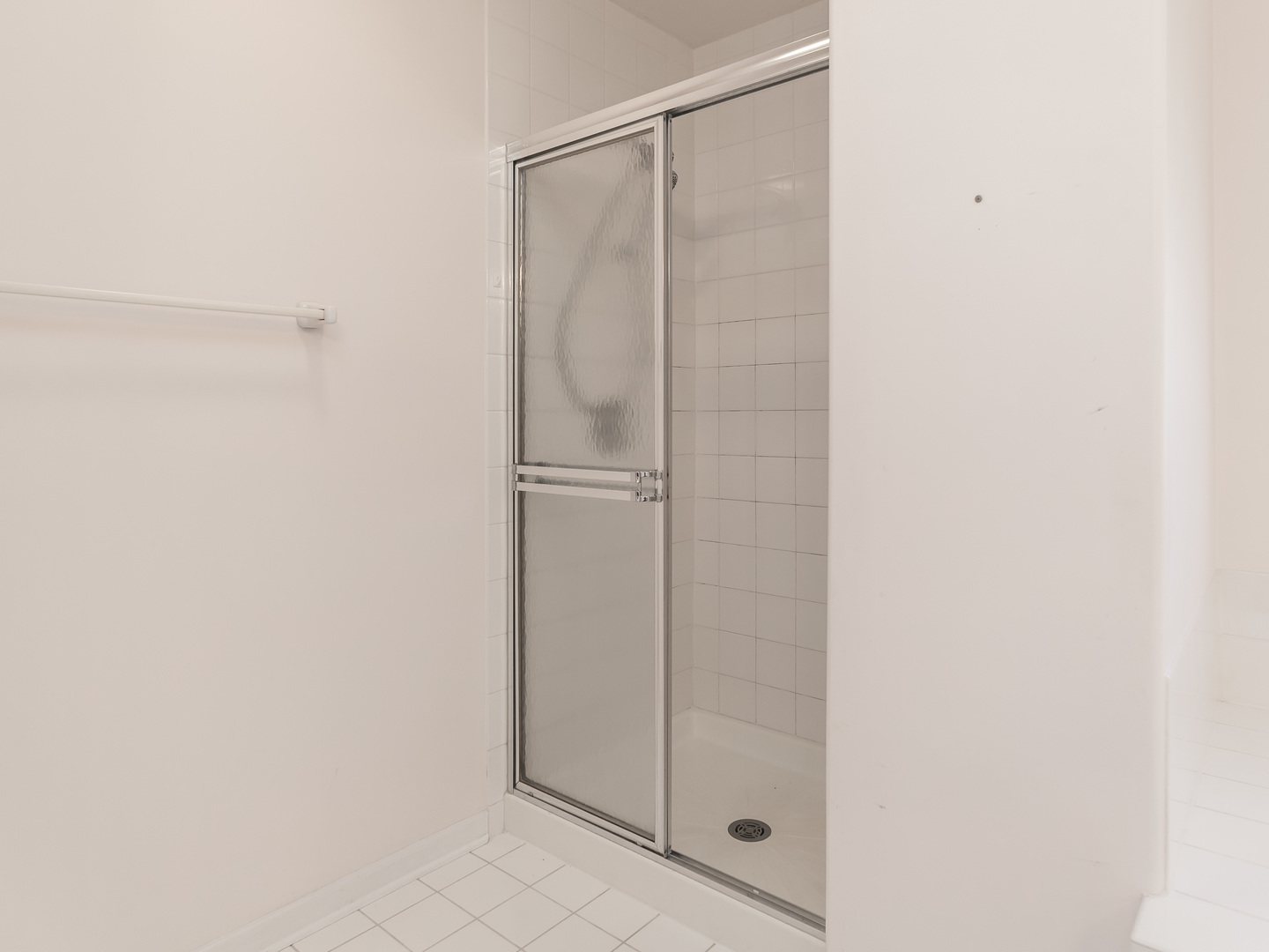 1415 Stonegate Road Algonquin, IL 60102 - Photo 26 of 49 a bathroom with a glass shower door