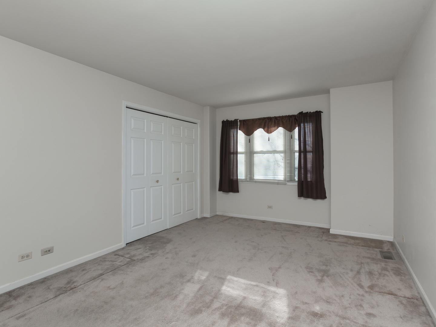 1415 Stonegate Road Algonquin, IL 60102 - Photo 29 of 49 a view of an empty room with a window