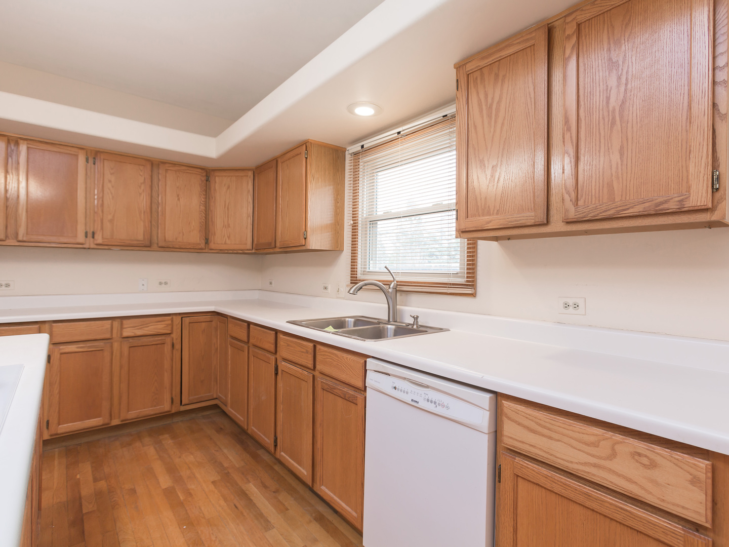 1415 Stonegate Road Algonquin, IL 60102 - Photo 10 of 49 a kitchen with a sink cabinets and window