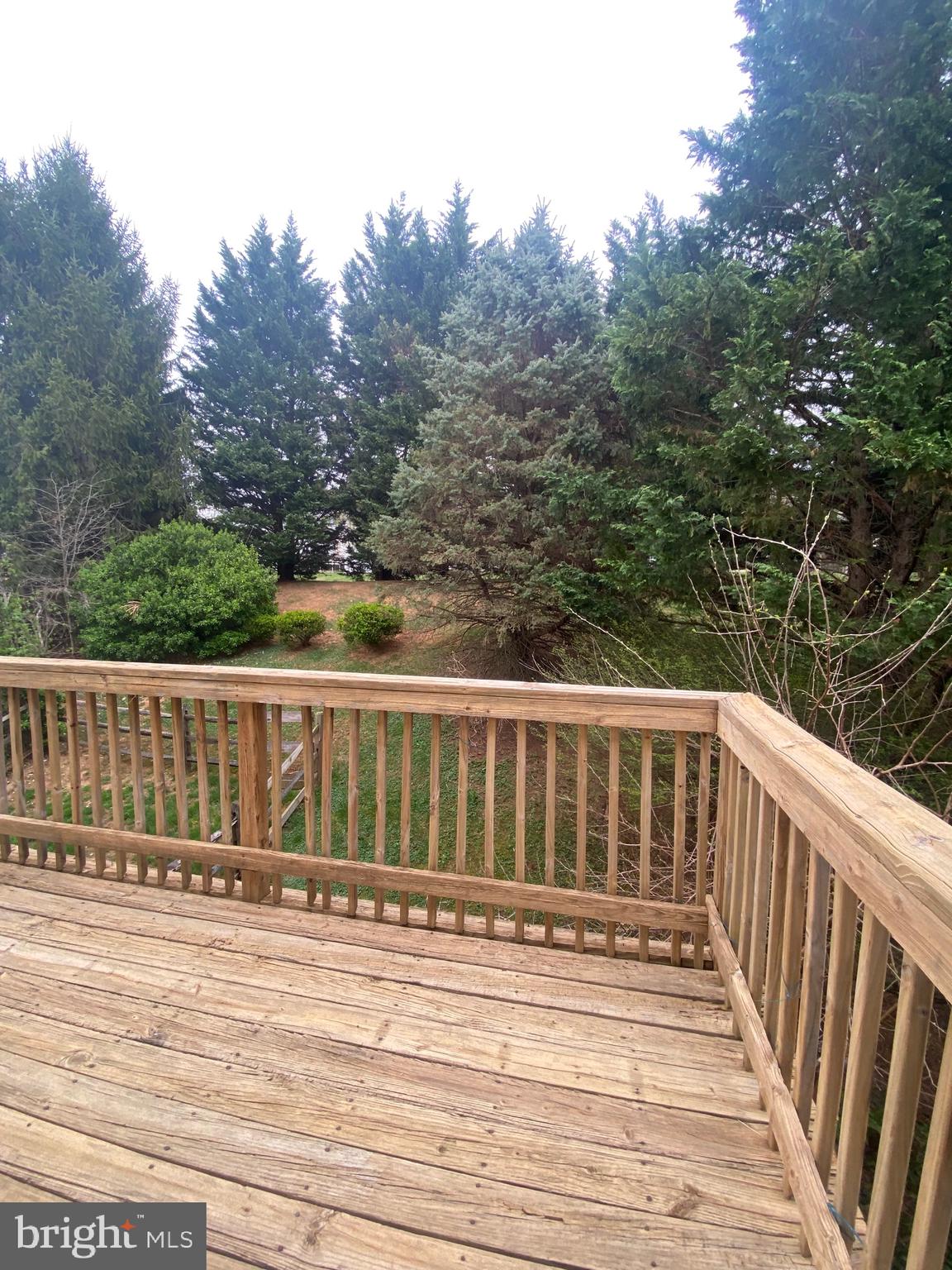 35 Perryfalls Place Nottingham, MD 21236 - Photo 3 of 16 a view of a wooden roof deck