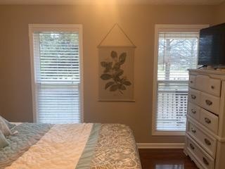 891 Nance Road Pulaski, TN 38478 - Photo 12 of 26 a bedroom with a bed and a flat tv screen on dresser