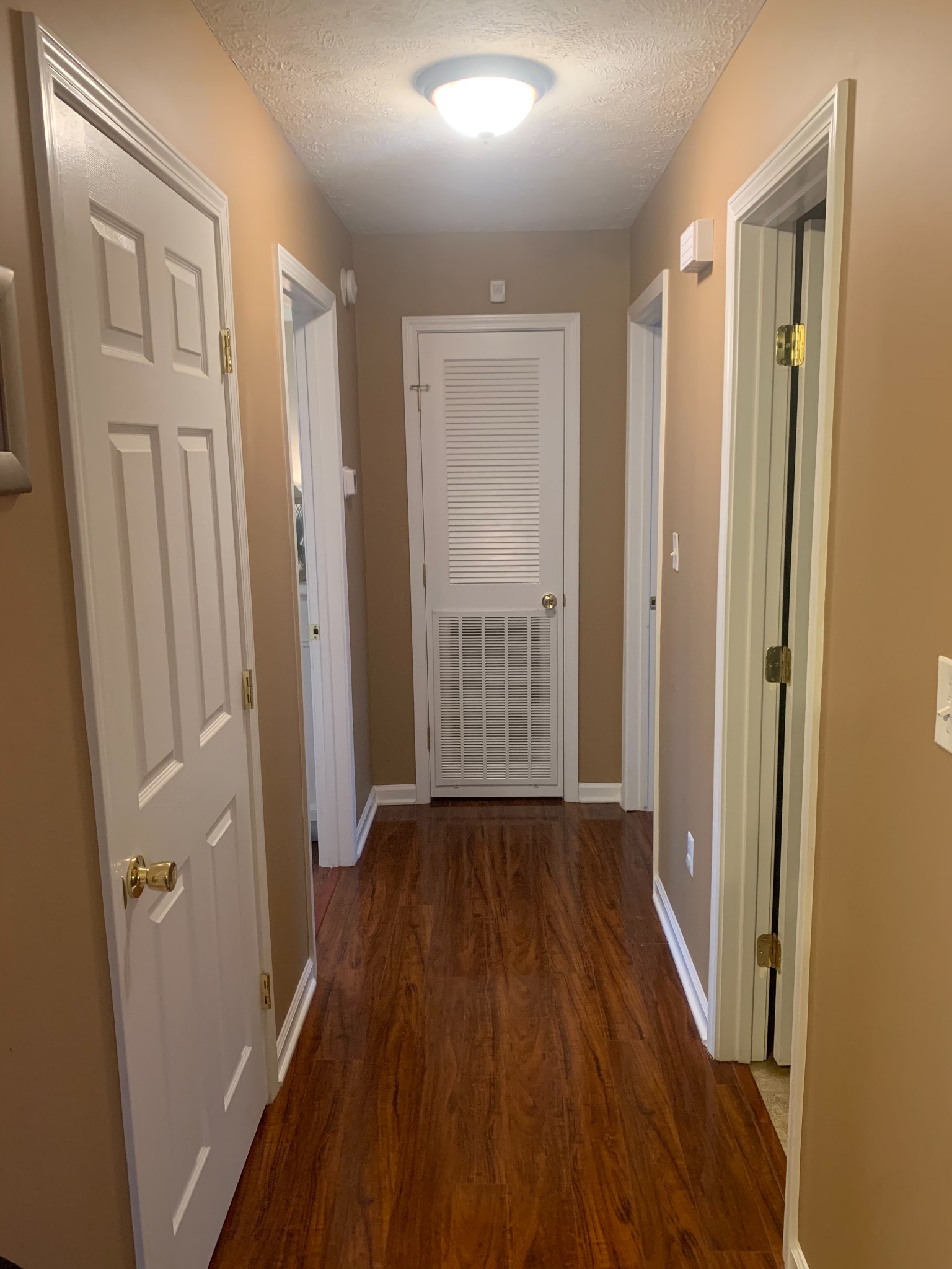 891 Nance Road Pulaski, TN 38478 - Photo 13 of 26 a view of a hallway with wooden floor