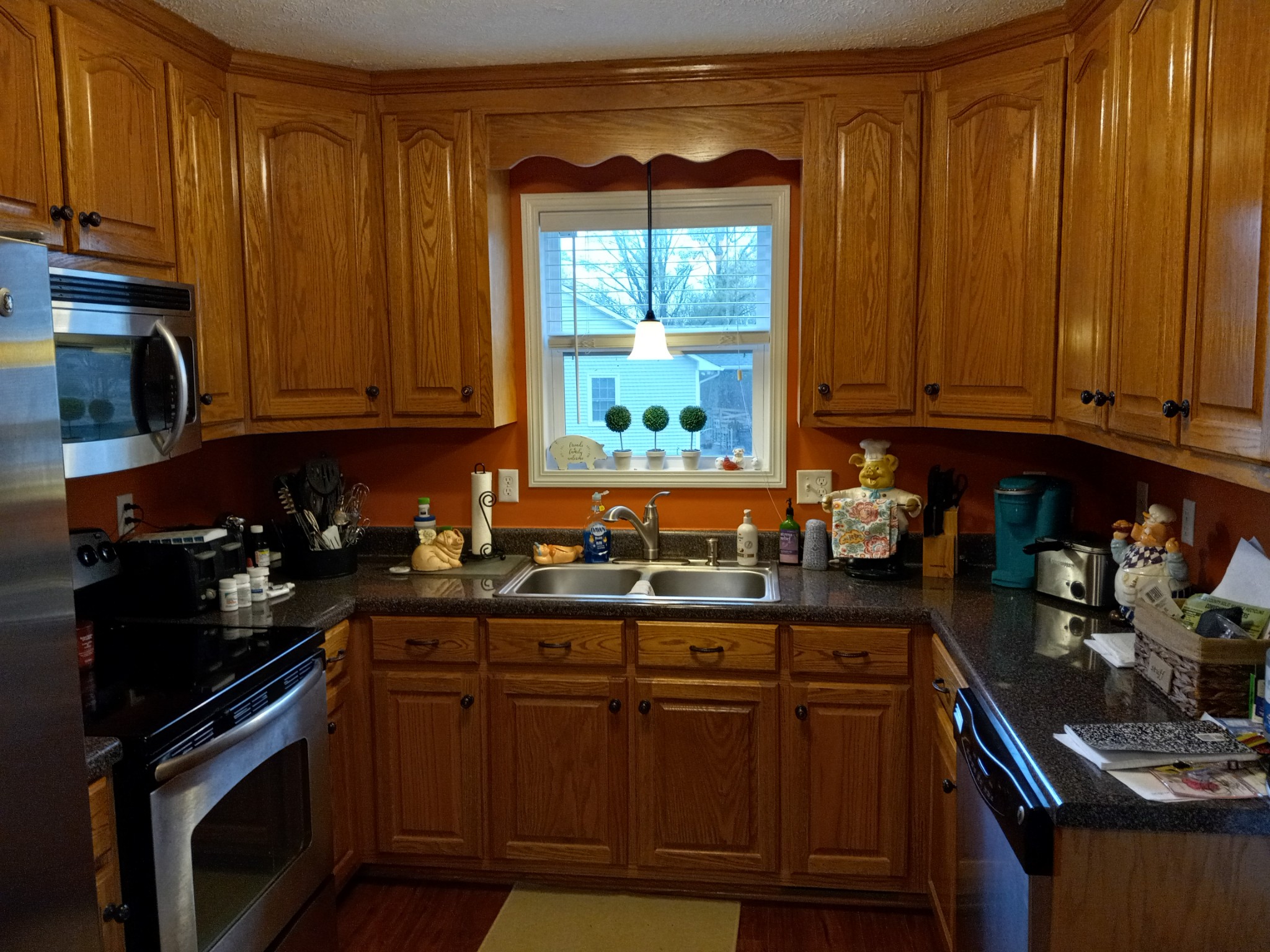 891 Nance Road Pulaski, TN 38478 - Photo 20 of 26 a kitchen with granite countertop wooden cabinets and a stove top oven