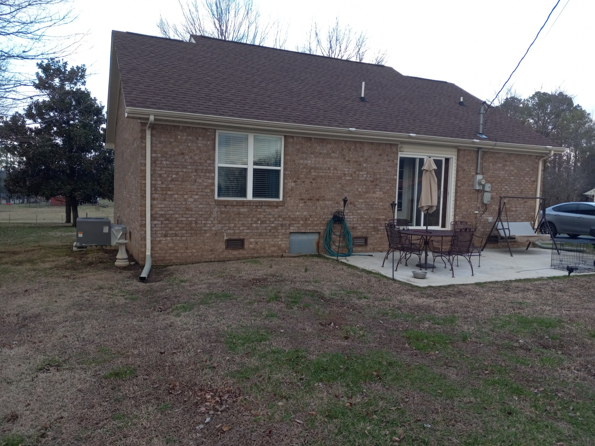 891 Nance Road Pulaski, TN 38478 - Photo 21 of 26 a view of house with backyard and chairs