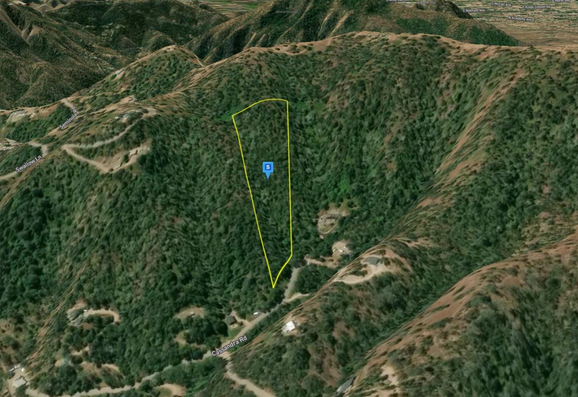 29130 Cassandra Road Tollhouse, CA 93667 - Photo 3 of 5 an aerial view of a house with a lush green forest
