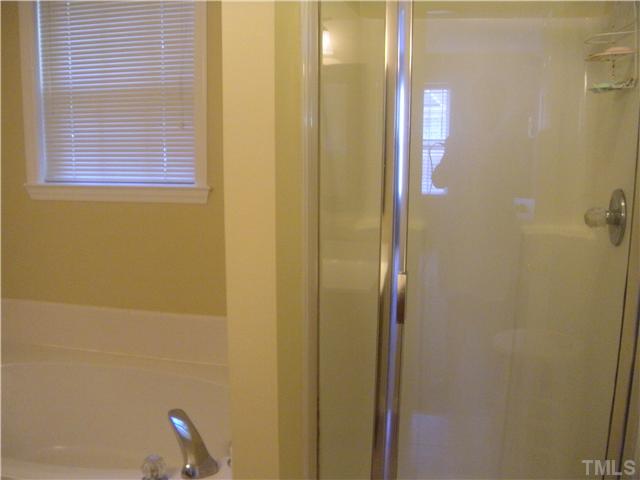 2913 New Hall Court Raleigh, NC 27615 - Photo 20 of 25 Soaking tub and separate shower