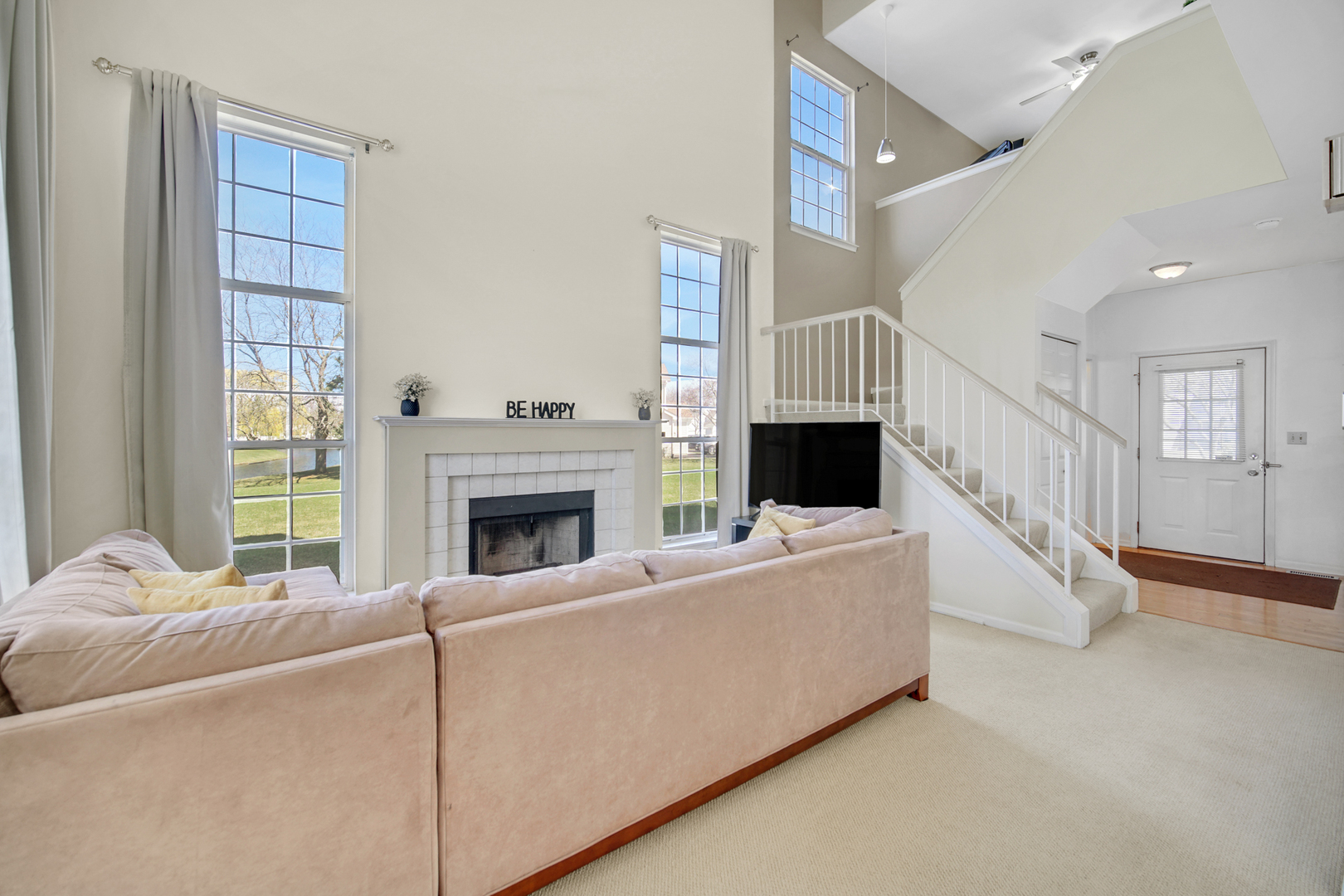 17848 Braewick Road, Unit 17848 Gurnee, IL 60031 - Photo 4 of 22 a living room with furniture and a fireplace