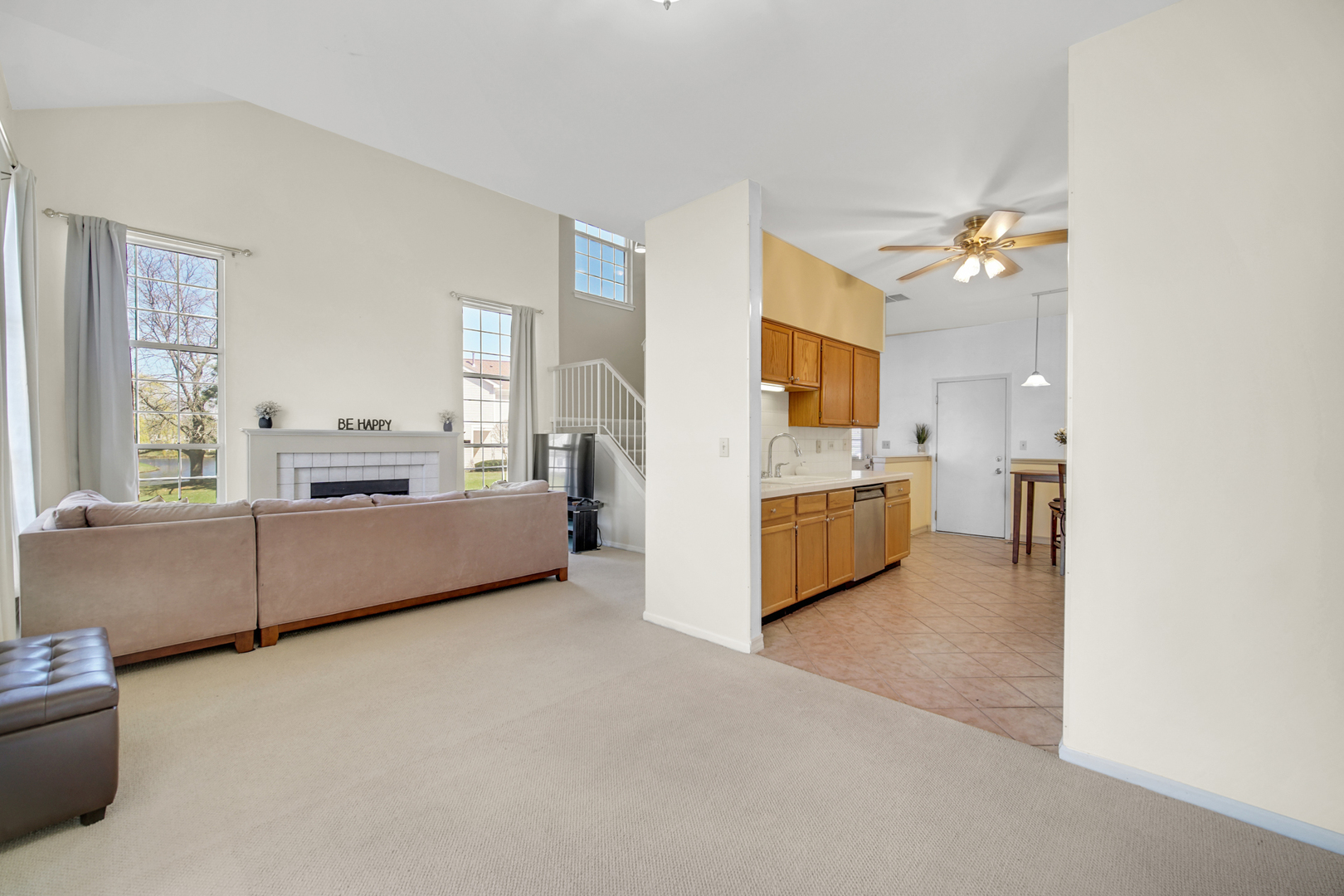 17848 Braewick Road, Unit 17848 Gurnee, IL 60031 - Photo 7 of 22 a living room with furniture and a chandelier