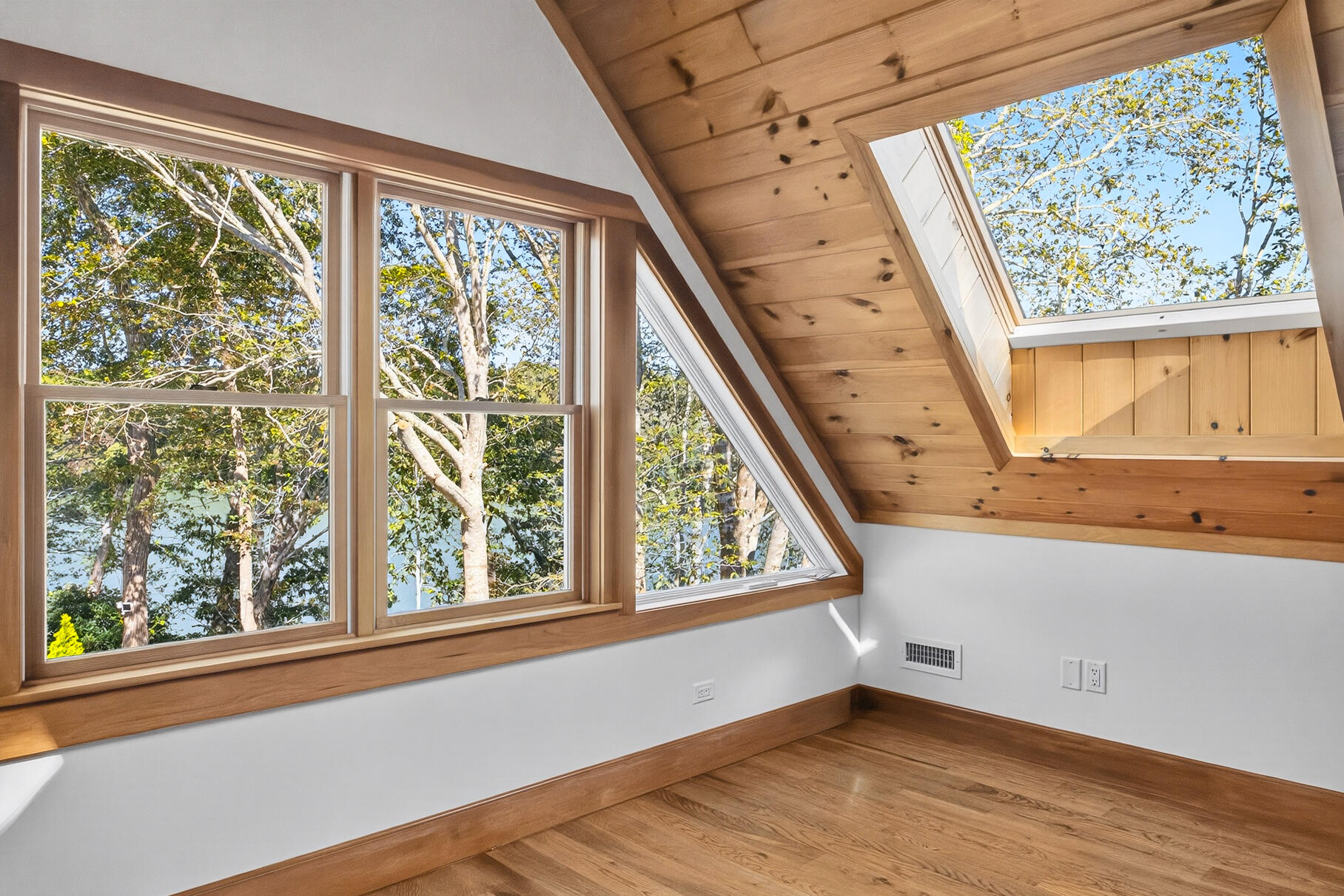 131 Timberlane Drive Mashpee, MA 02649 - Photo 38 of 57 a view of an empty room with wooden floor and a window