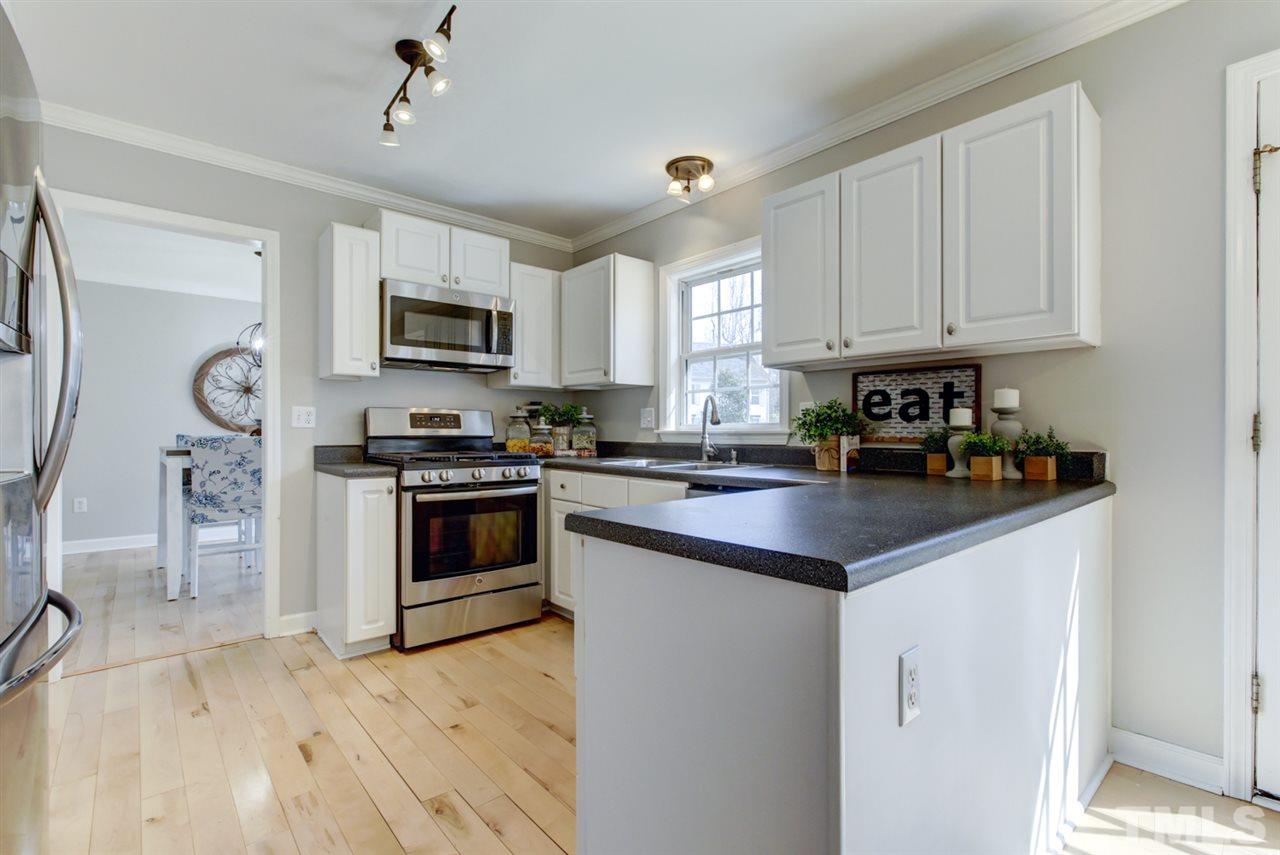 8504 Buscot Court Raleigh, NC 27615 - Photo 2 of 15 Another view of the bright open kitchen.