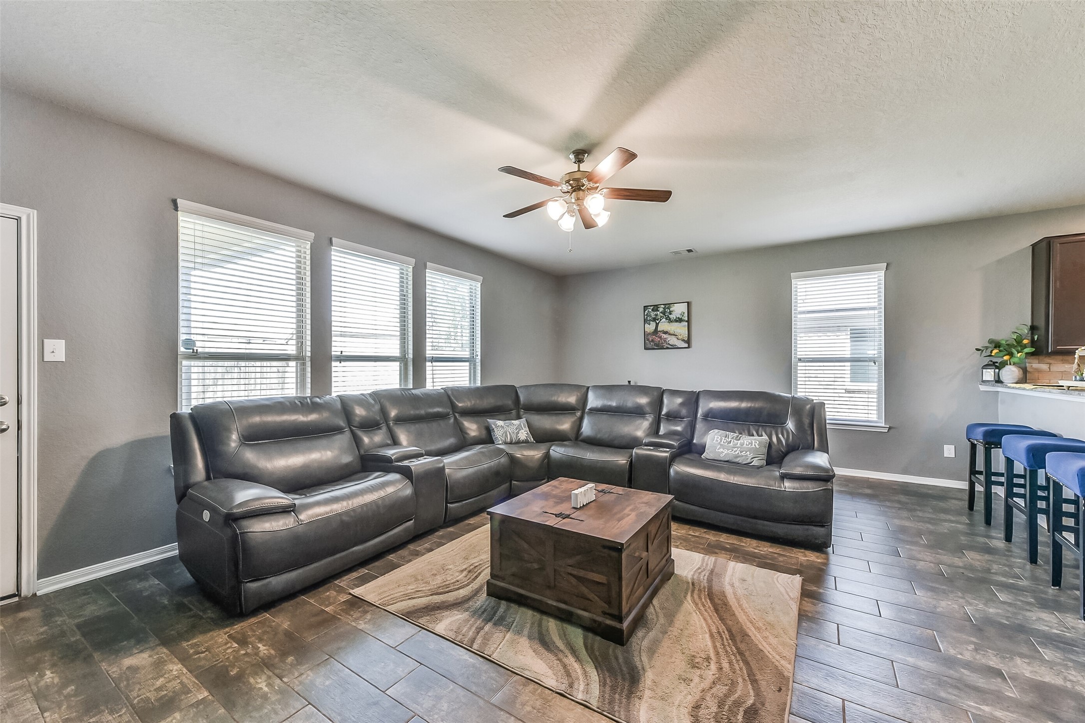 29418 Ridge Clearing Trail Spring, TX 77386 - Photo 11 of 37 a living room with furniture ceiling fan and a window