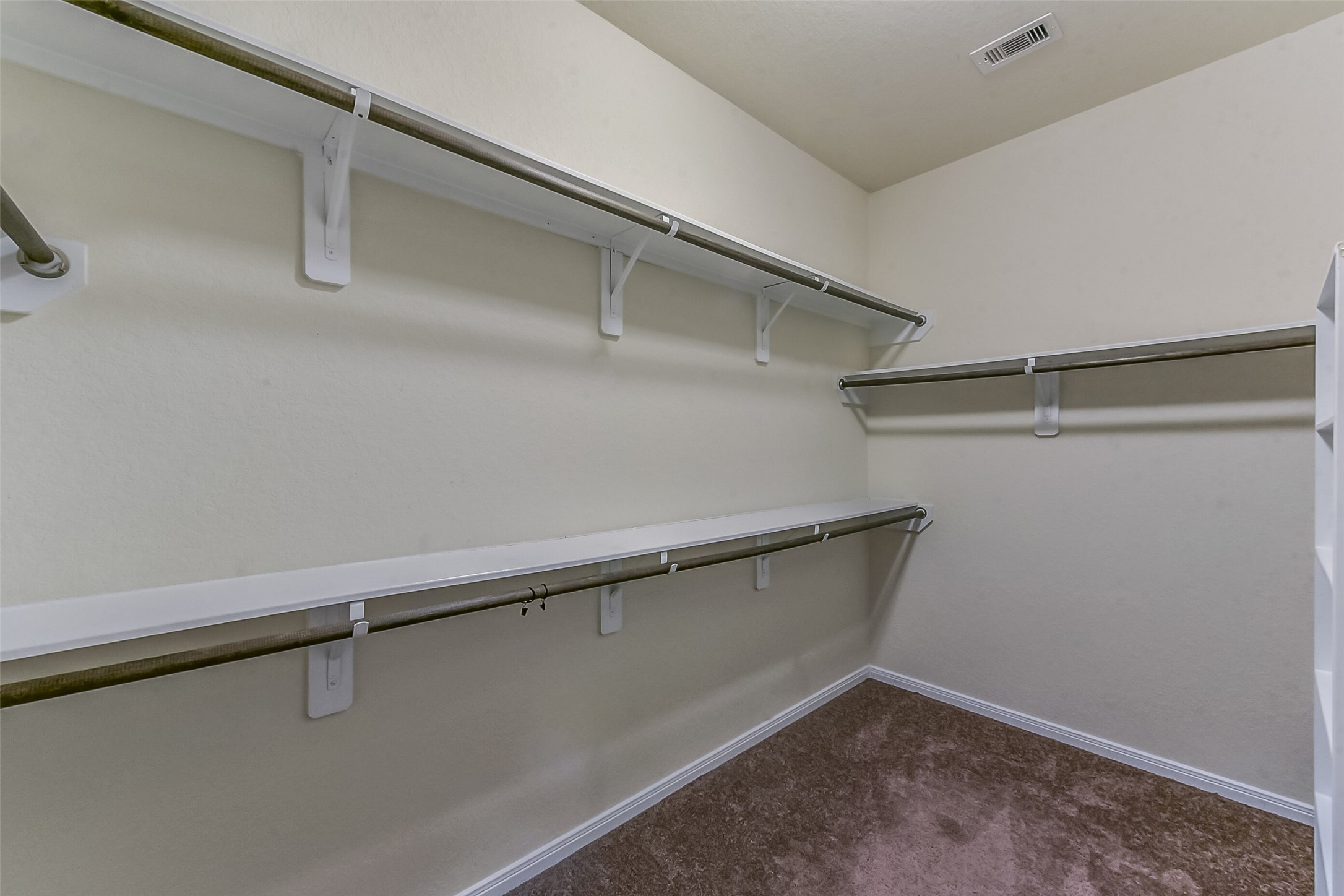 29418 Ridge Clearing Trail Spring, TX 77386 - Photo 19 of 37 a view of a room with racks on the wall