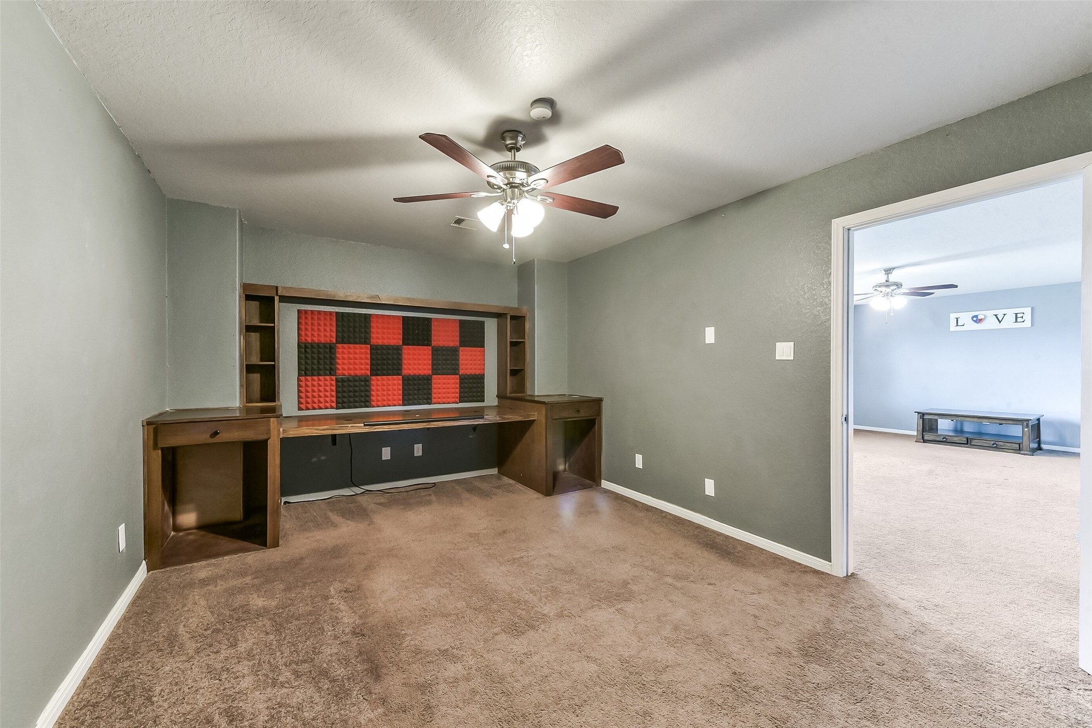 29418 Ridge Clearing Trail Spring, TX 77386 - Photo 23 of 37 an empty room with windows and ceiling fan